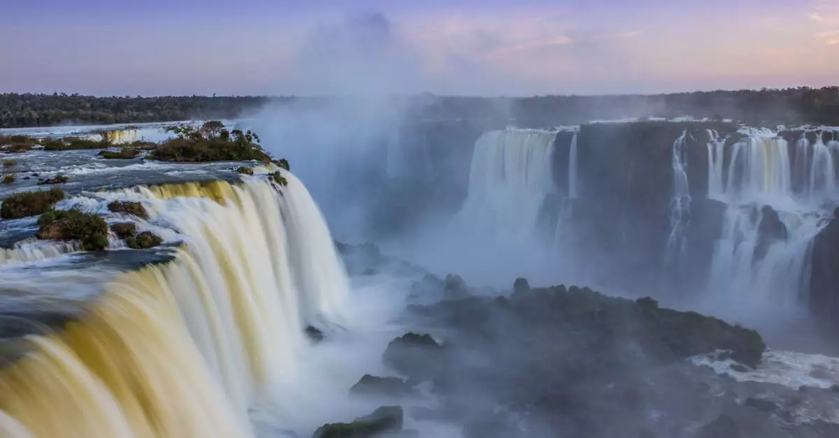 Breathtaking view of Iguassu Falls during sunrise in Foz do Igua&ccedil;u, Brazil.