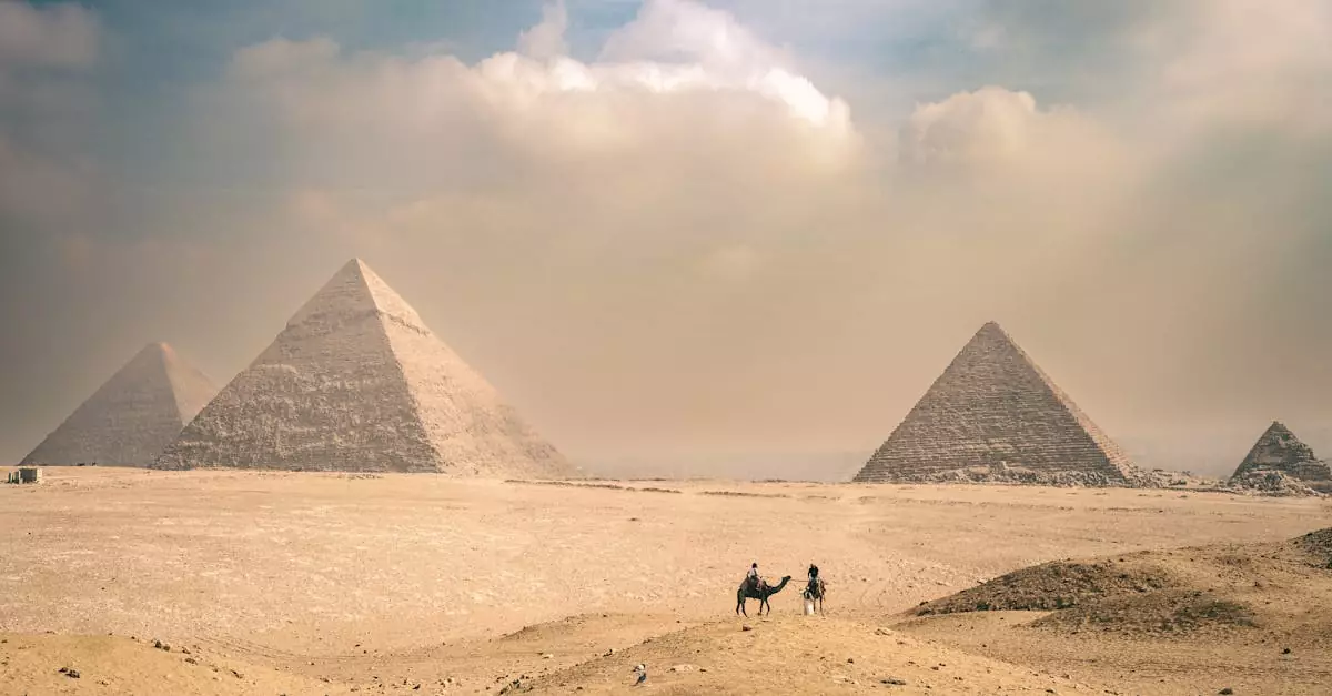 Explore the majestic Pyramids of Giza under a sunny sky with distant travelers on camels.