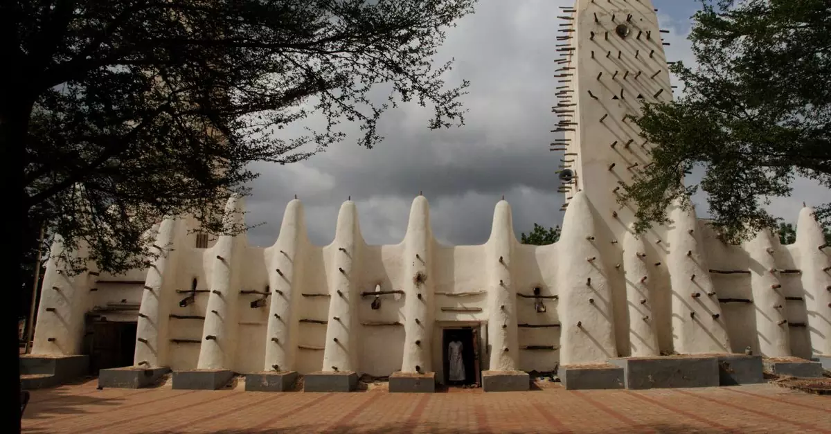 Stunning view of the Grand Mosque in Bobo-Dioulasso, Burkina Faso with dramatic sky.
