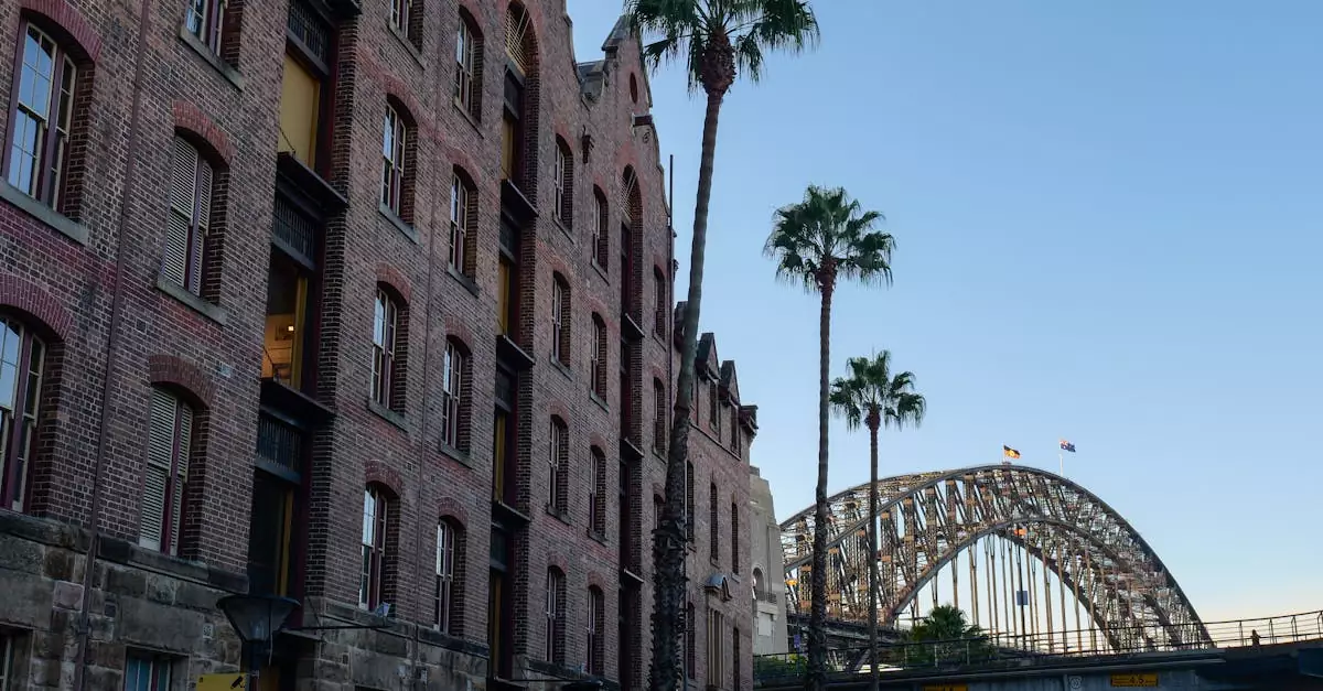 Explore the historic architecture and iconic Sydney Harbour Bridge in this urban shot.