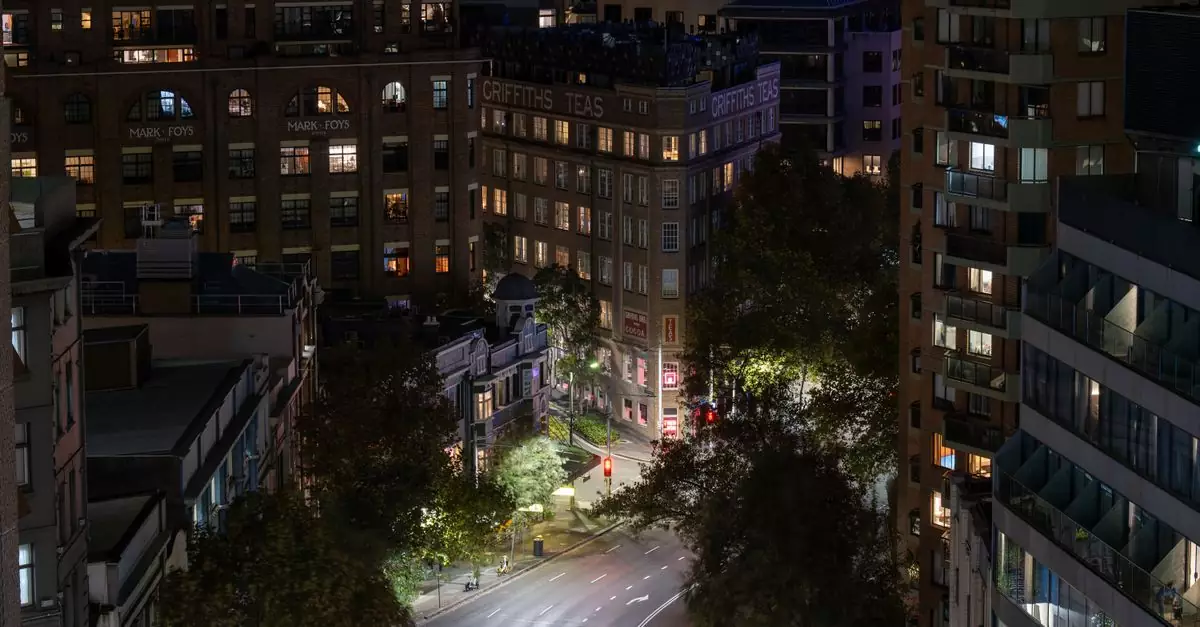 Captured Griffiths Teas Building and city lights illuminating a quiet night in downtown Sydney, Australia.