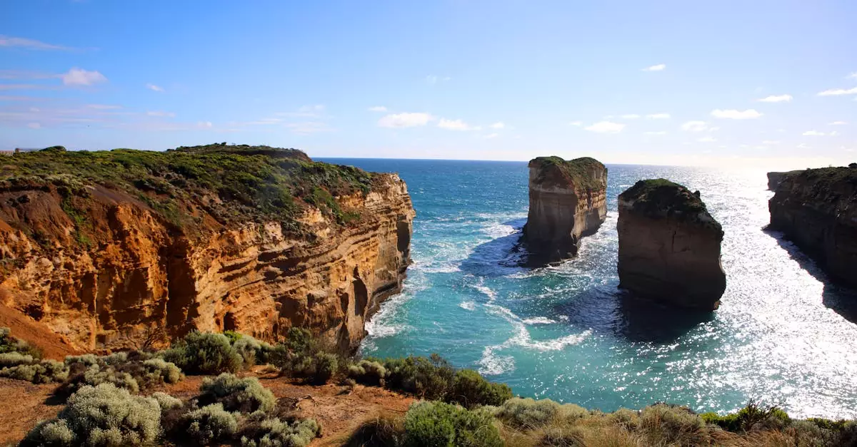 Breathtaking view of rugged coastal cliffs and rock formations along Australia's Great Ocean Road.