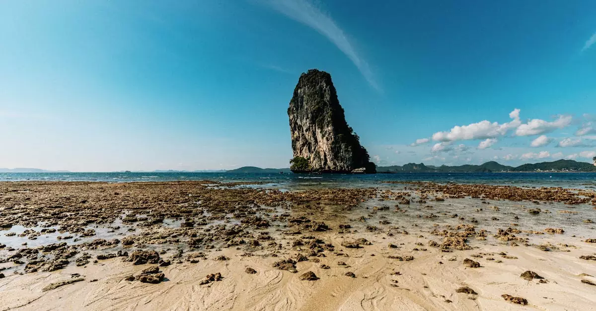Stunning view of a unique rock formation rising from the sea in Phang Nga, Thailand.