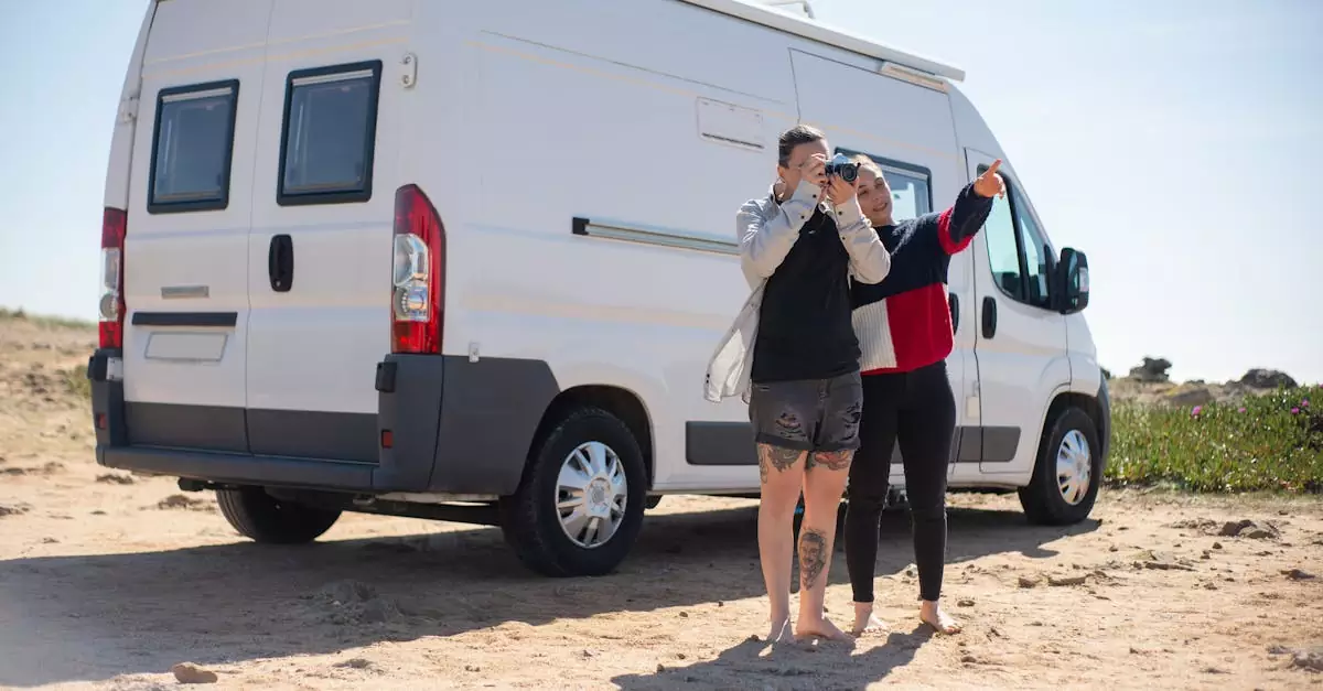 A couple enjoys a summer road trip in a campervan on the scenic Portuguese coastline.