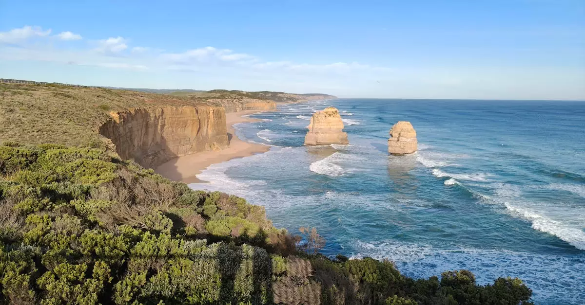 Explore the stunning limestone cliffs and ocean waves along the Great Ocean Road near Lorne, Victoria.