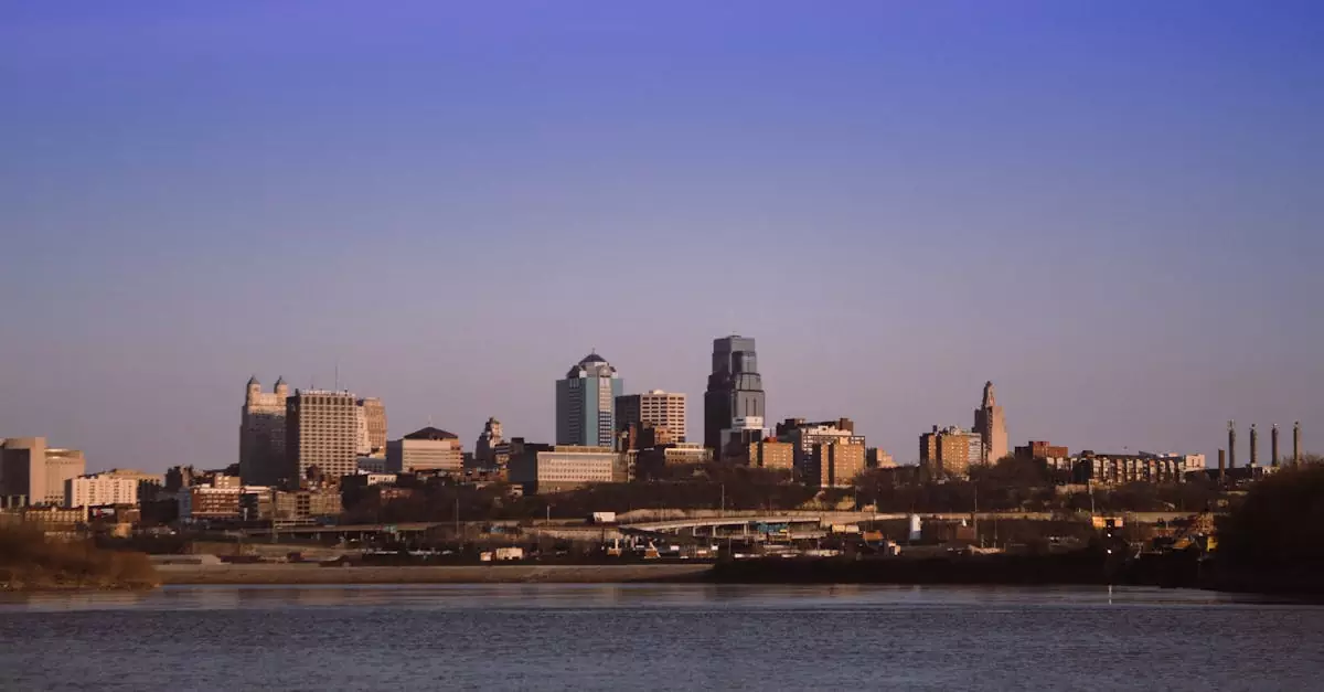 Stunning view of Kansas City skyline captured from Kaw Point Park under a clear blue sky.