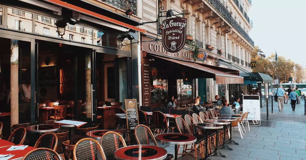 Inviting sidewalk caf&eacute; in Paris with outdoor seating and classic architecture.