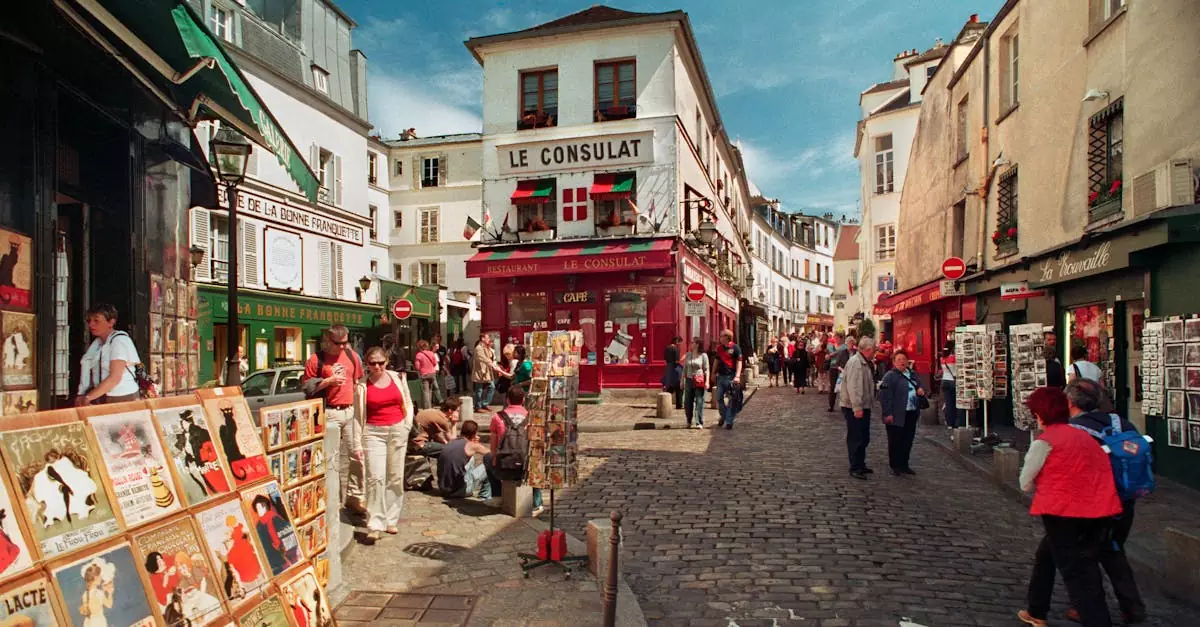 Charming view of Montmartre's cobblestone market street bustling with people on a sunny day.