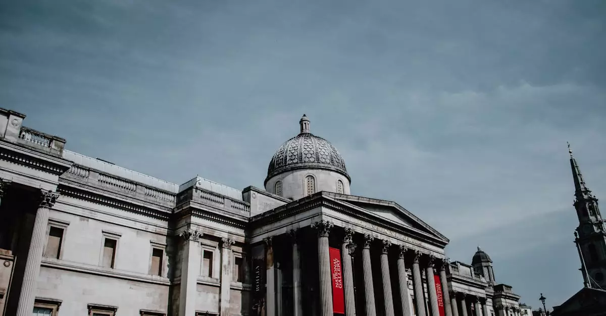 The National Gallery in London, a famous architectural landmark, captured under a clear sky.