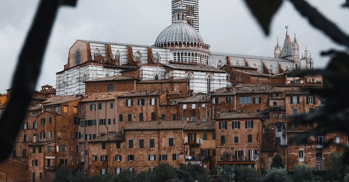 Captivating view of Siena Cathedral with surrounding medieval architecture in Tuscany, Italy.