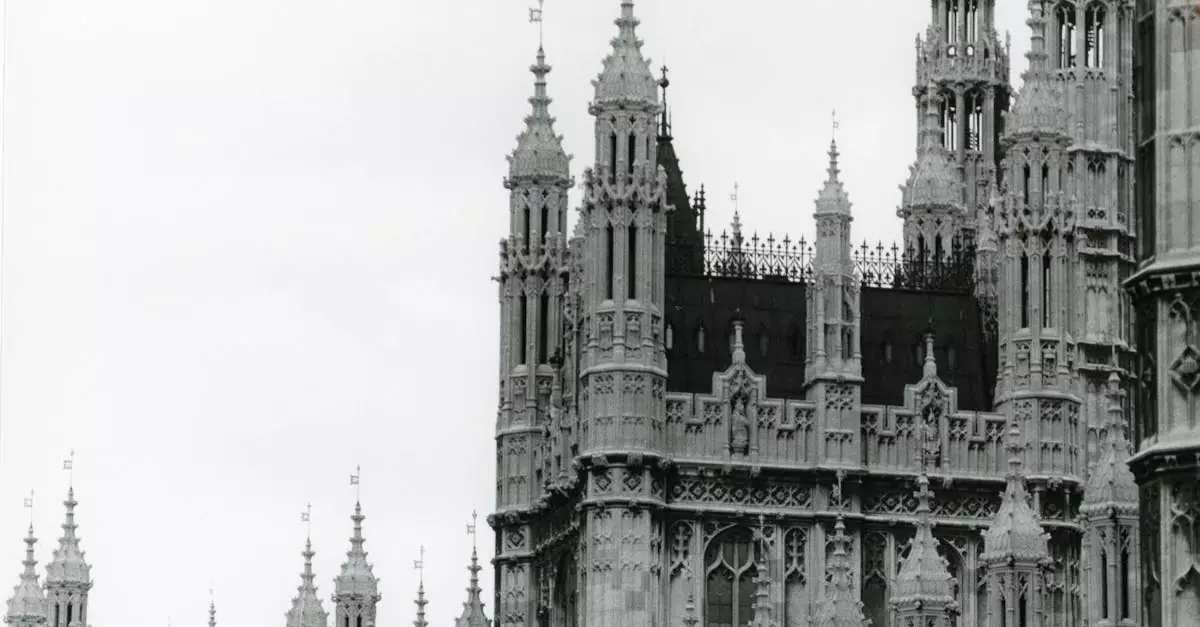 Detailed black and white photo of Gothic architecture at a famous London landmark.