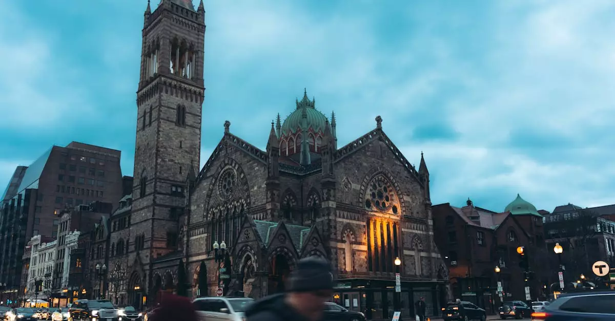View of the iconic Old South Church with traffic at twilight in Boston, Massachusetts.