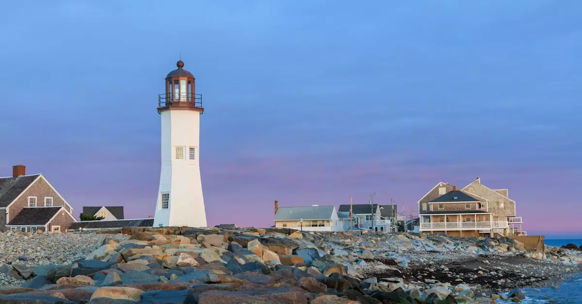 A picturesque view of Scituate Lighthouse against a sunset sky in Massachusetts.