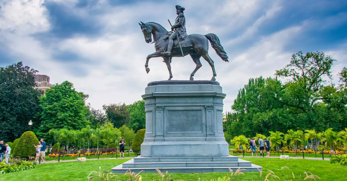 Statue of George Washington on horseback in Boston Public Garden surrounded by foliage.