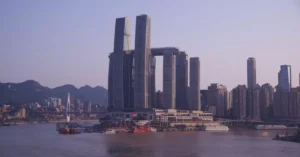 Captivating view of Raffles City and skyline by the Yangtze River in Chongqing, China.