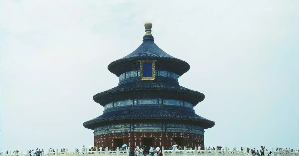The iconic Temple of Heaven in Beijing, a renowned UNESCO World Heritage site, with visiting tourists.