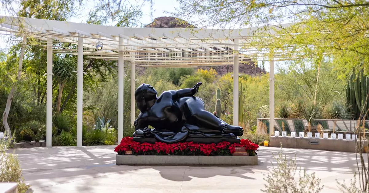 Artistic sculpture surrounded by poinsettias in the Desert Botanical Garden, Phoenix, Arizona.