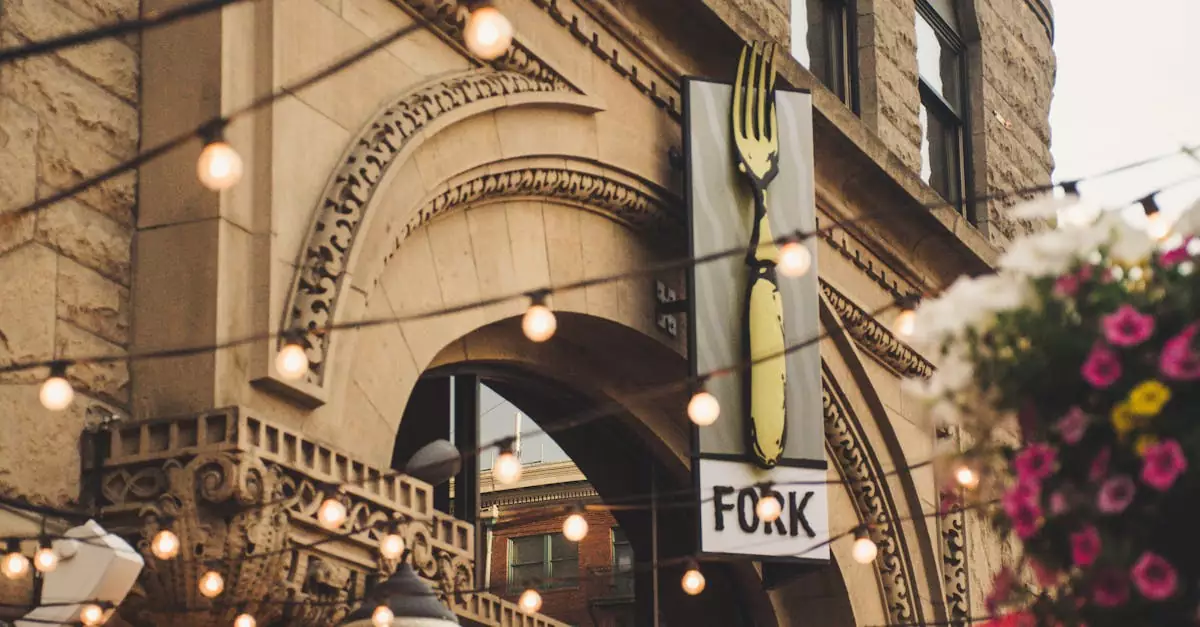 Elegant archway of Fork restaurant in Boise, Idaho with lights and flowers.