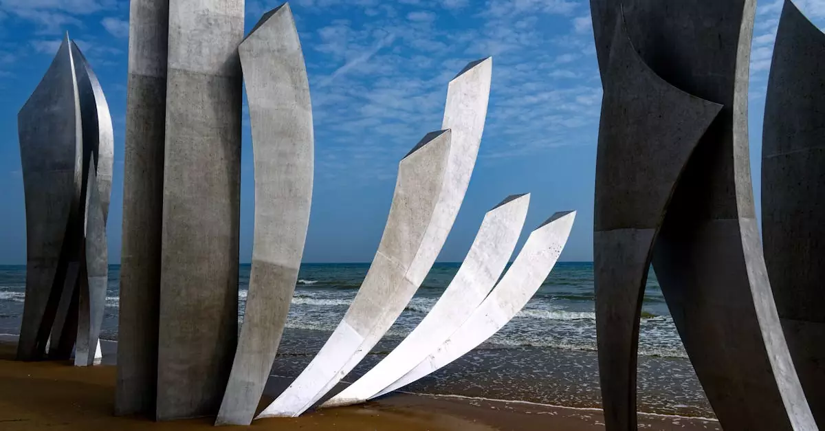 Stunning view of the Omaha Beach Memorial sculptures at Saint-Laurent-sur-Mer with the sea and sky as a backdrop.