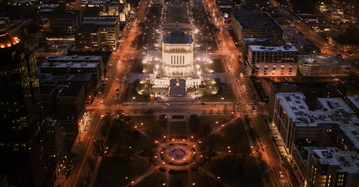 Breathtaking aerial night view of downtown Indianapolis featuring city lights and urban architecture.