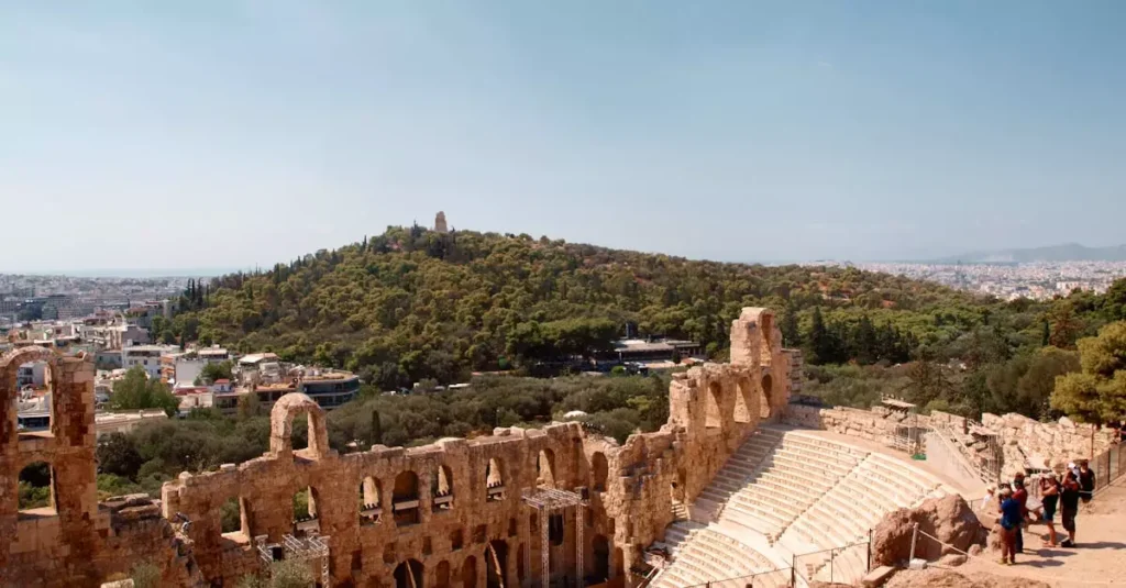 Best Places to Visit in Greece: Expert Guide 2 Ancient theater Odeon of Herodes Atticus below the Acropolis in Athens, Greece.