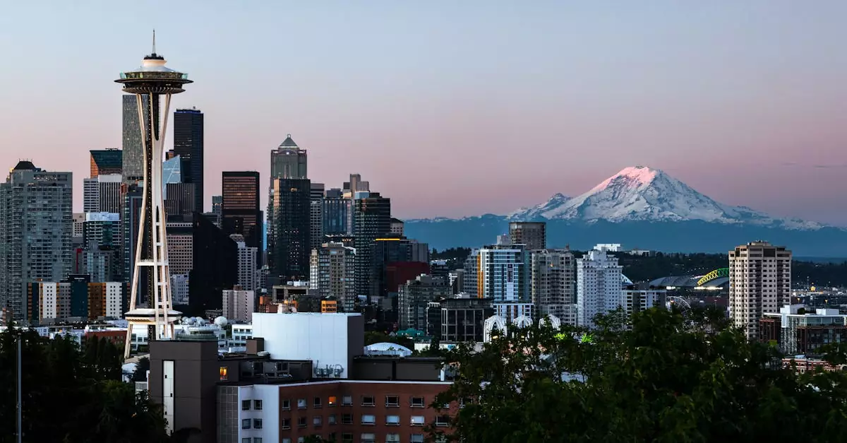 Captivating view of Seattle's skyline featuring the Space Needle and Mount Rainier at dawn.