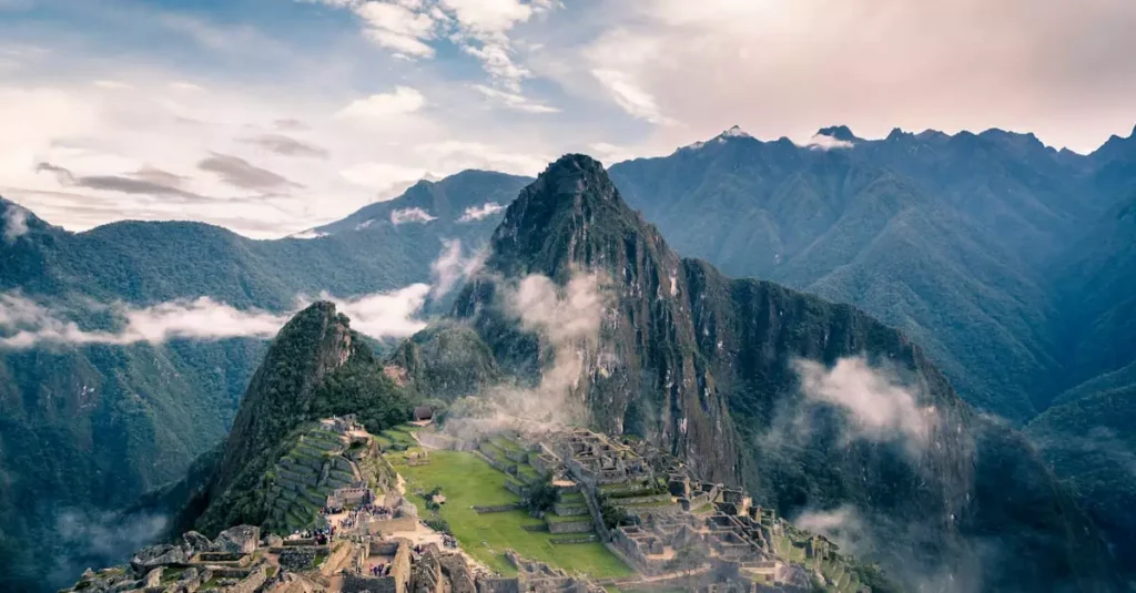 Best Scenic Destinations in Peru: Bucket List Journey 11 Stunning aerial view of Machu Picchu, capturing the ancient Inca citadel amidst Peruvian mountains.
