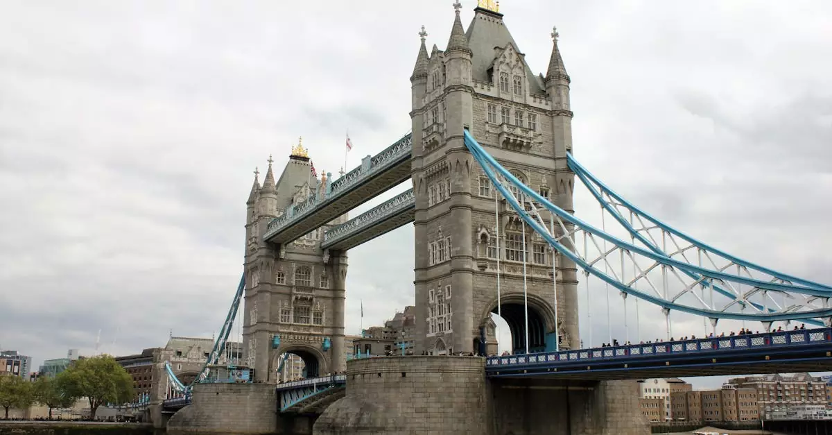 Iconic Tower Bridge spanning the River Thames in London, a notable architectural landmark.
