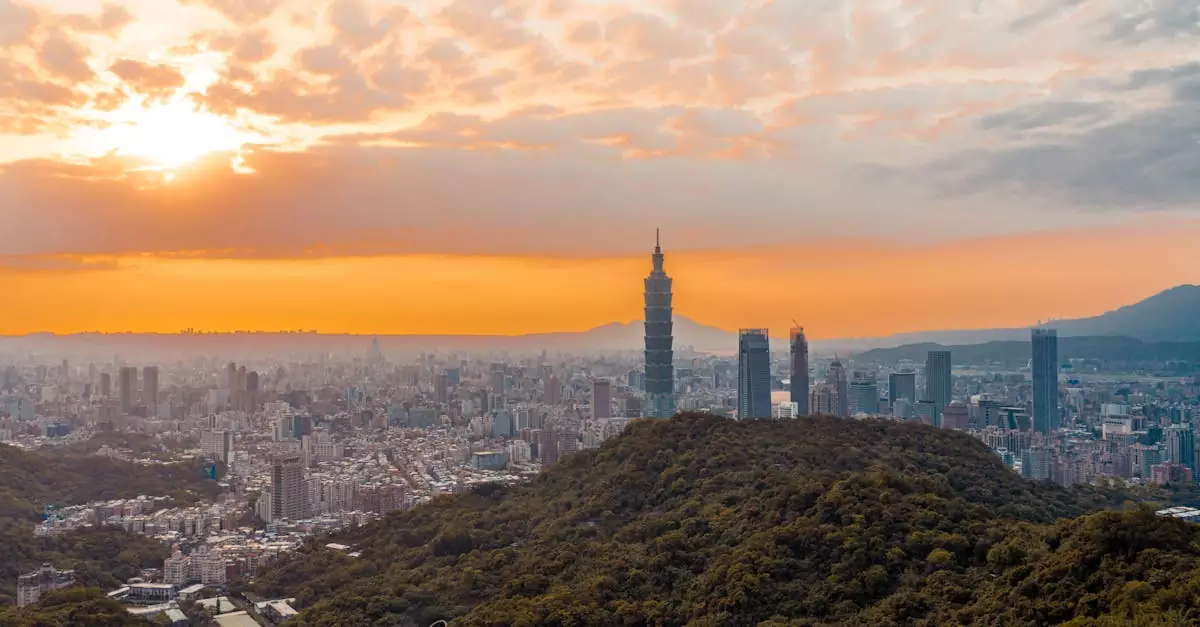Stunning sunset view of Taipei City skyline with Taipei 101 and lush hills in the foreground.
