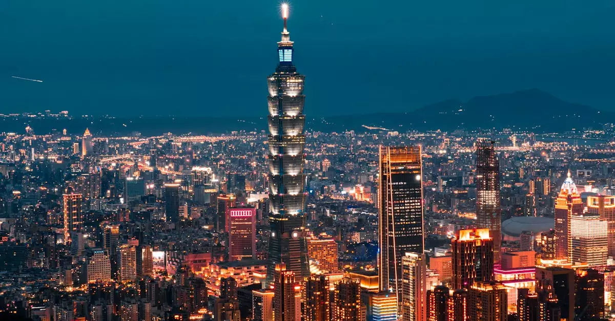 A breathtaking nighttime skyline view of Taipei 101 and surrounding illuminated skyscrapers in Taiwan.