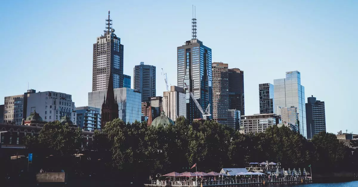 A breathtaking view of Melbourne's skyline over the waterfront, showcasing modern skyscrapers.
