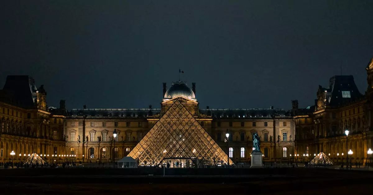 Discover the iconic Louvre Pyramid glowing against the Paris night sky.