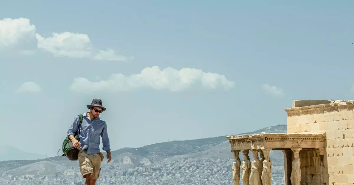 A man walking near the Erechtheion temple, enjoying a sunny day in Athens, Greece.