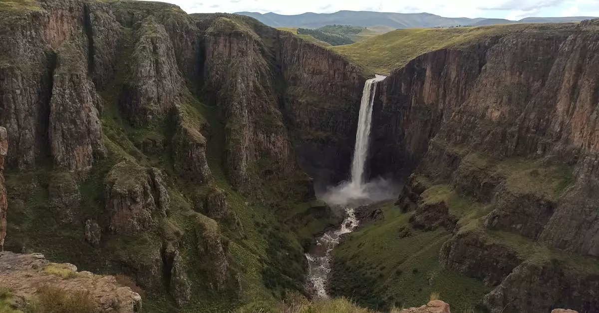 Breathtaking view of Maletsunyane Falls cascading through cliffs in FS, South Africa.