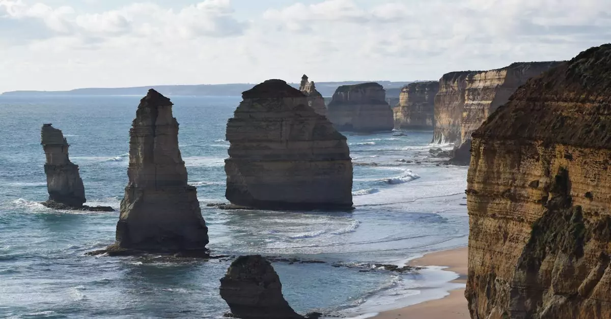 Breathtaking view of iconic rock formations along the Australian seashore at Great Ocean Road.