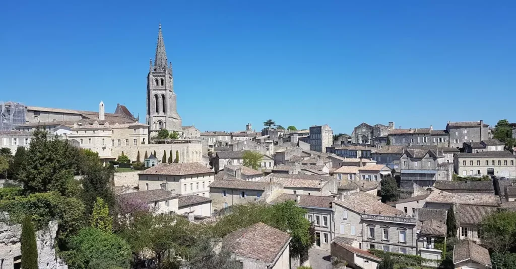 Charming medieval town of Saint-Émilion, UNESCO heritage site, with a historic bell tower.