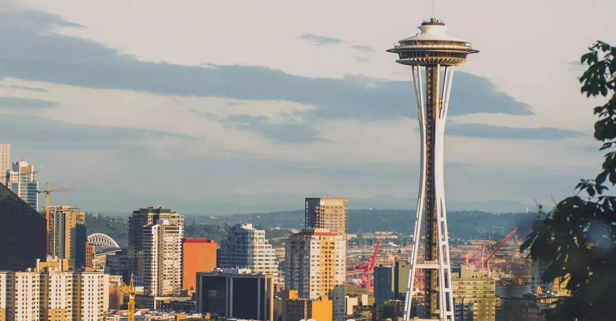 Vibrant skyline of Seattle featuring the iconic Space Needle under a clear sky.
