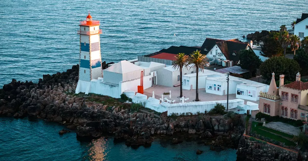 Aerial view of Cascais Lighthouse and coastal buildings, Portugal.