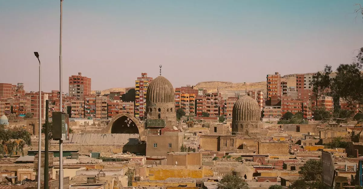 View of a cityscape blending ancient domed structures with modern buildings.