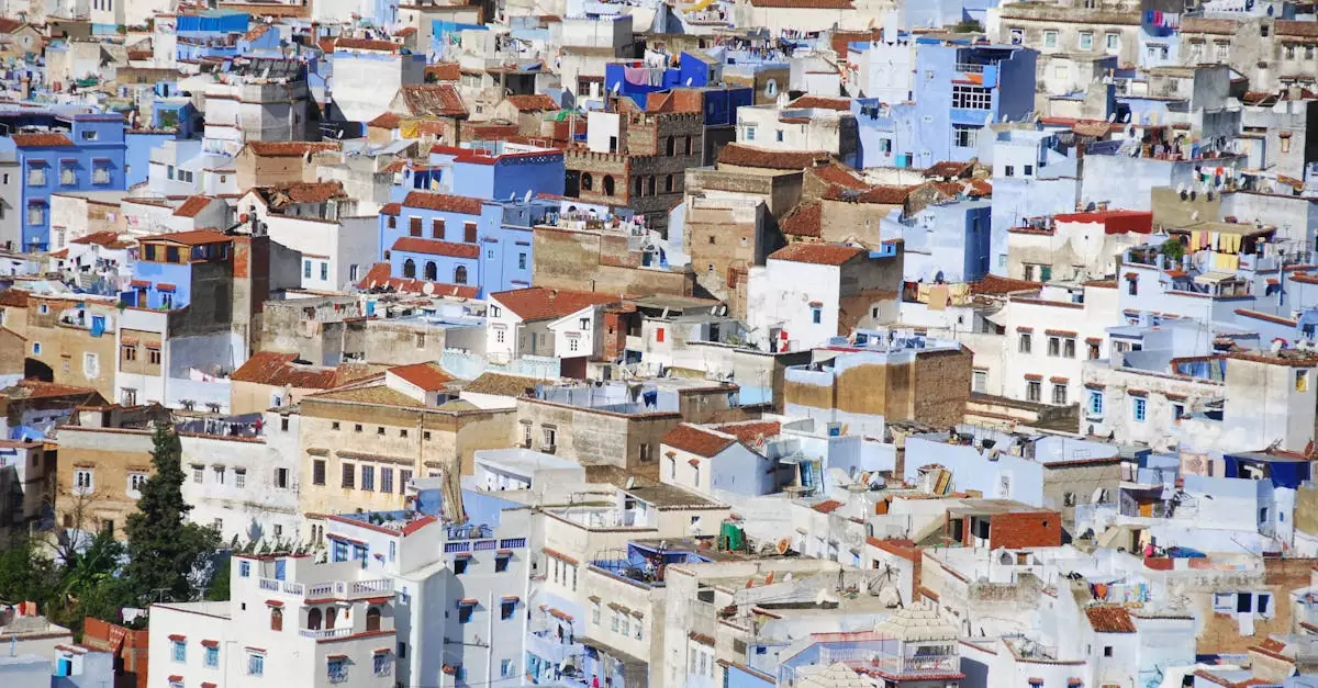 Stunning aerial view of the iconic blue city Chefchaouen, showcasing intricate architecture and vibrant colors.