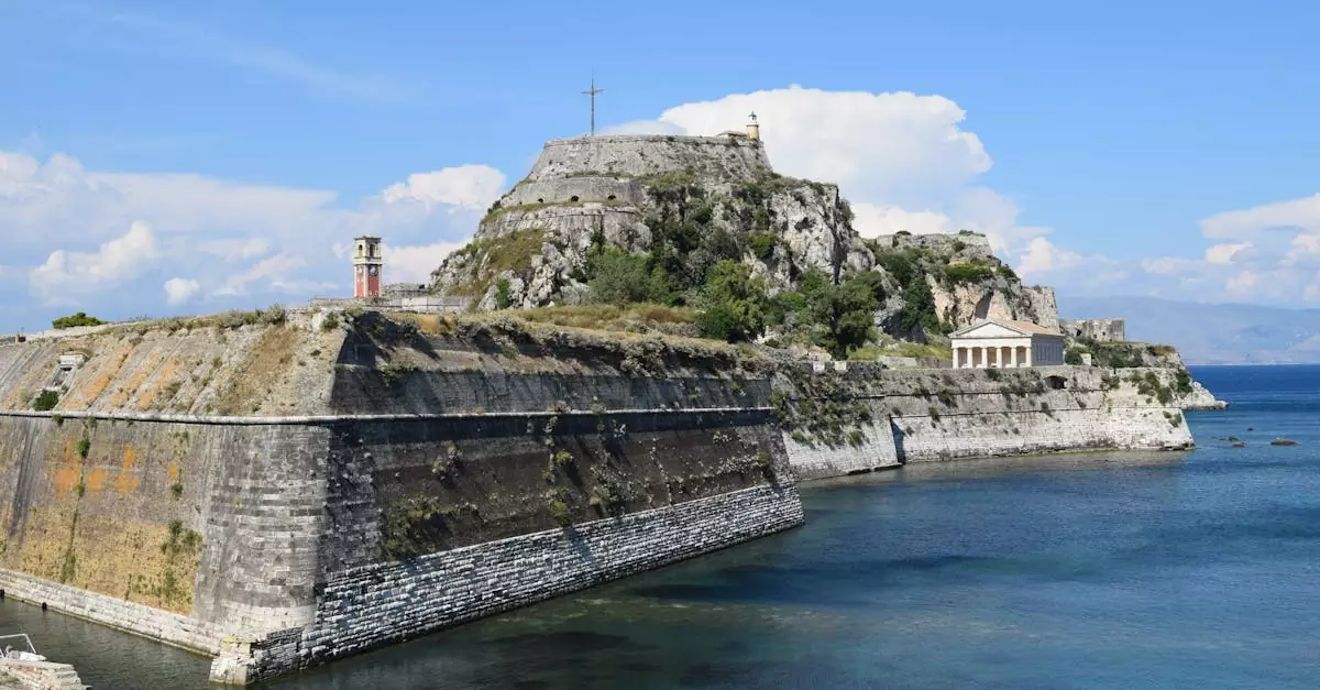Stunning view of the Old Fortress in Corfu, Greece with a backdrop of the ocean and sky.