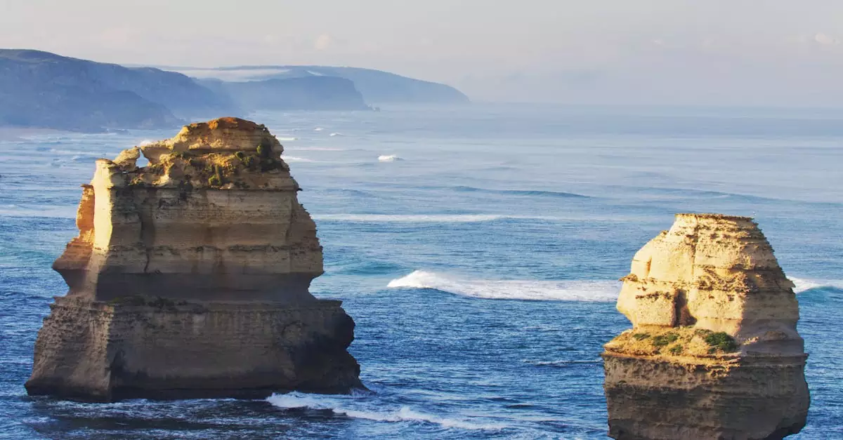 Explore the breathtaking view of the Twelve Apostles sea stacks along the Great Ocean Road in Victoria, Australia.