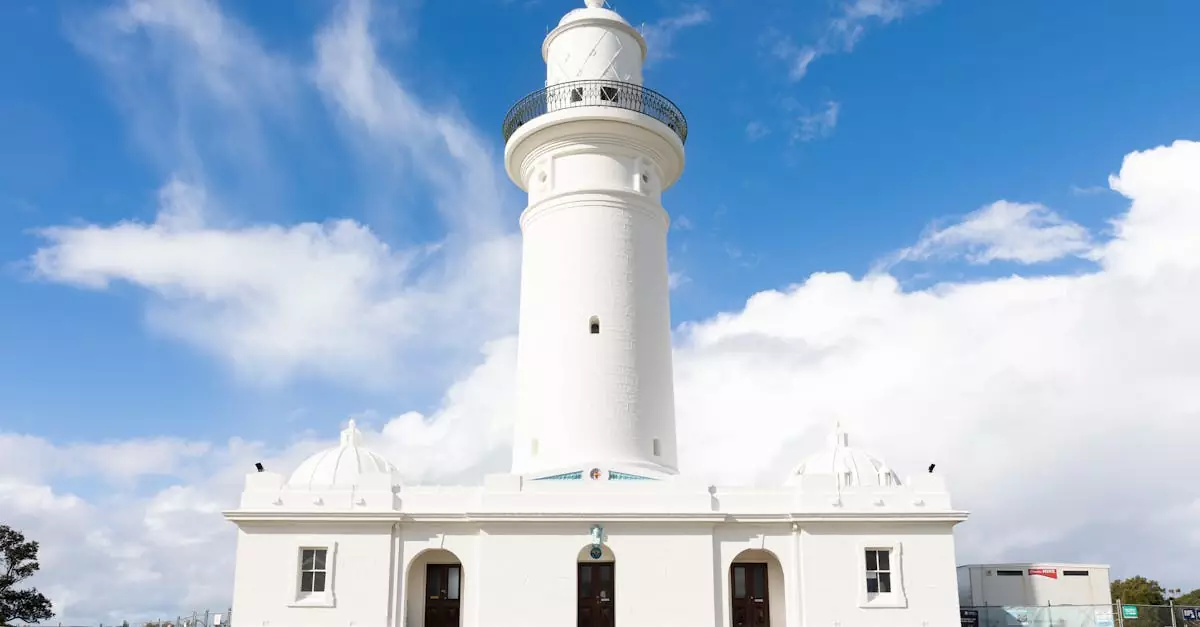Macquarie Lighthouse in Sydney, a heritage landmark under a clear blue sky.