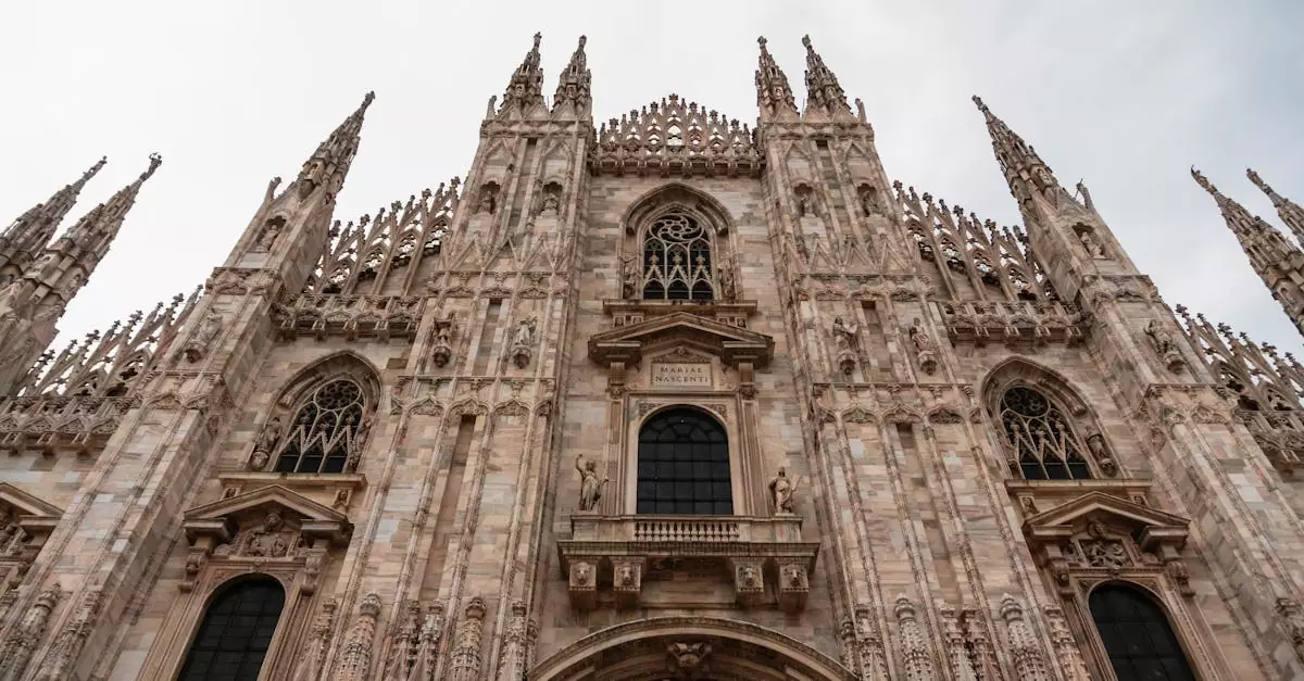 Stunning view of the intricate Gothic facade of Duomo di Milano in Italy.