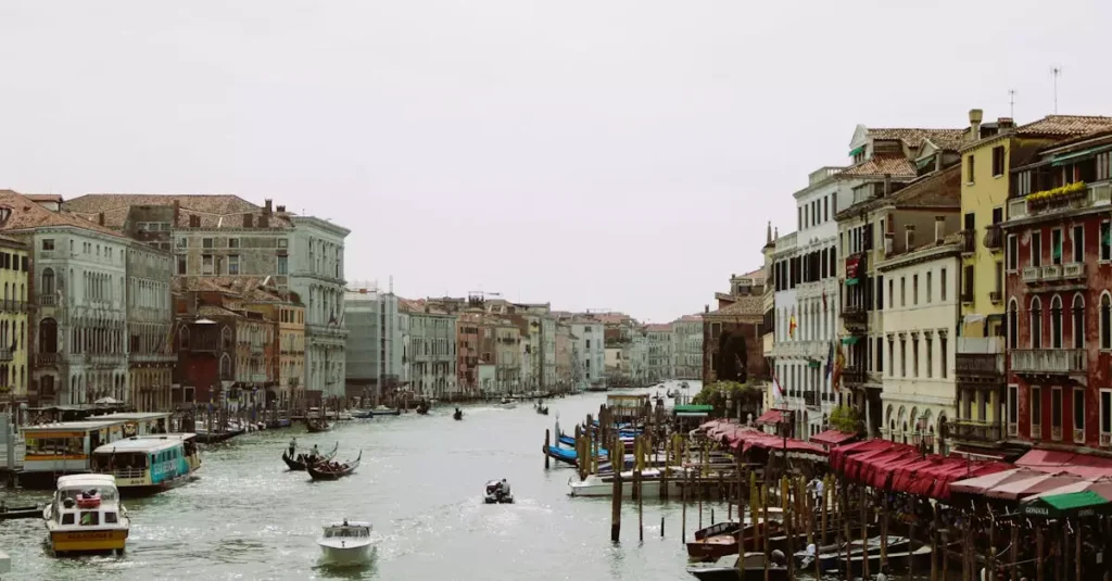 A picturesque view of Venice's Grand Canal filled with gondolas and historic architecture.