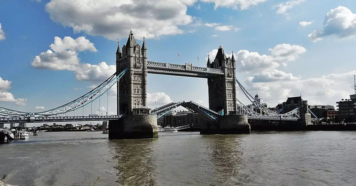 Stunning view of London's Tower Bridge with its bascules raised over the River Thames.