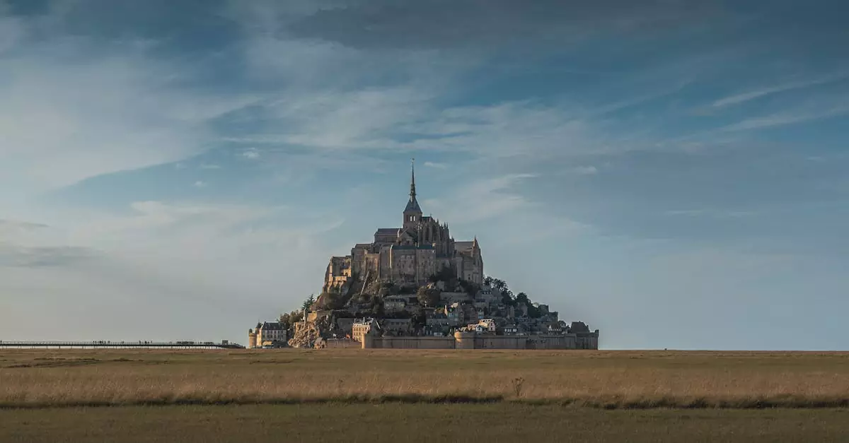 Breathtaking view of Mont Saint-Michel Abbey in Normandy at dusk.