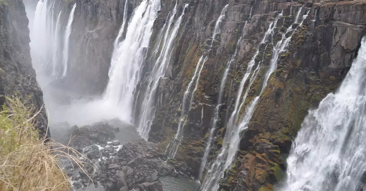 Stunning view of Victoria Falls cascading powerfully over rugged cliffs.