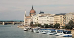 Scenic view of the Hungarian Parliament buildings alongside the Danube River in Budapest, Hungary.