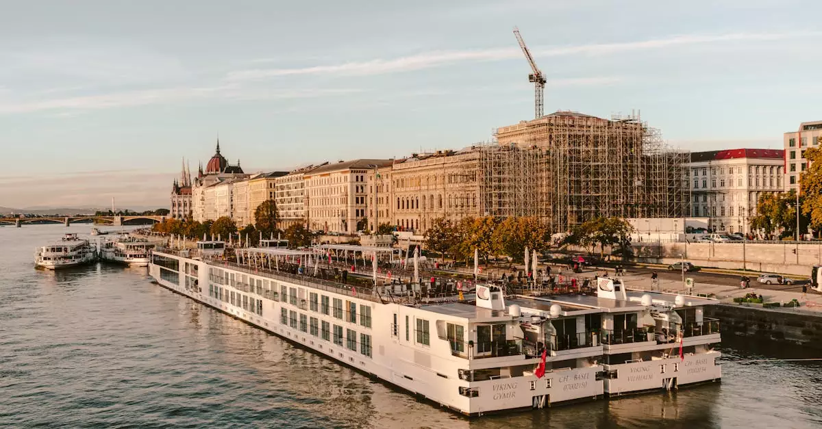Scenic view of cruise boat on the Danube River with Budapest architecture.